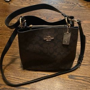 Coach crossbody satchel, brown and black